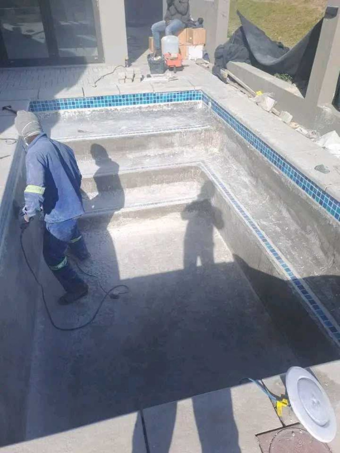Pool being resurfaced during renovation